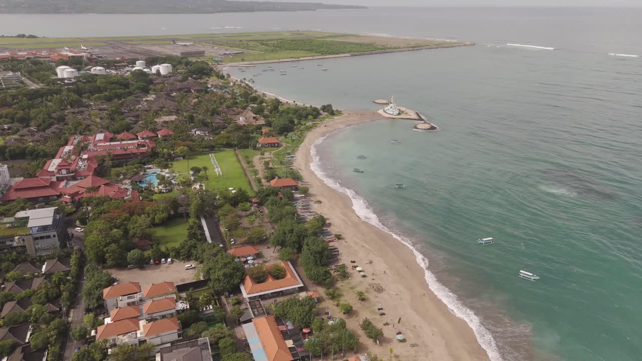 Aerial View of Pantai Jerman Beach and Resort, Bali – Soaring Over Golden Sands, Turquoise Waters, and Luxury Stays. Experience This Tropical Paradise