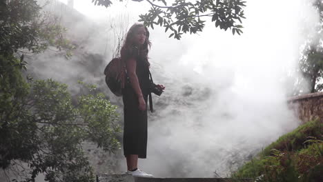 suprised latino woman travelling at warm hot springs azores