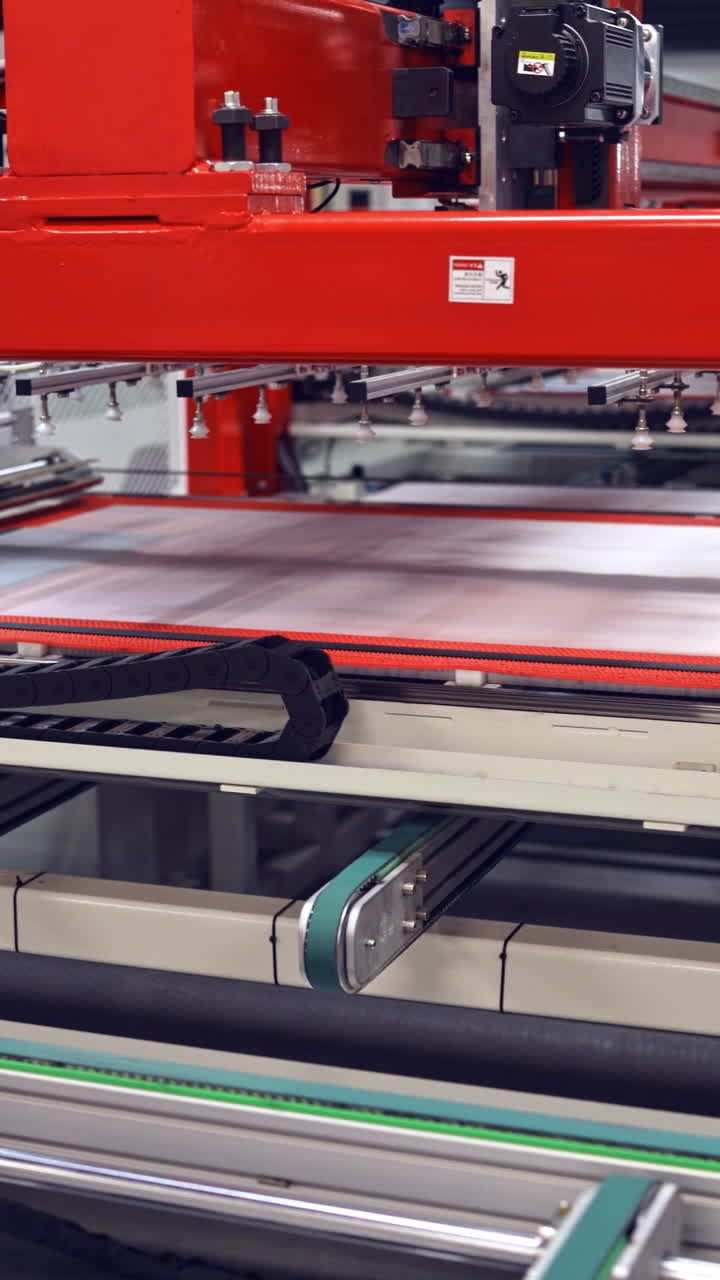 Modern automated production concept. Robotic factory for producing solar panels. Vertical video