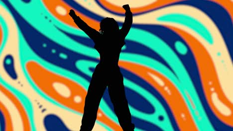 studio silhouette of woman dancing against multi coloured pattern background 2