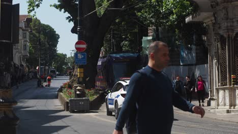 istanbul city street scene with tram and police car