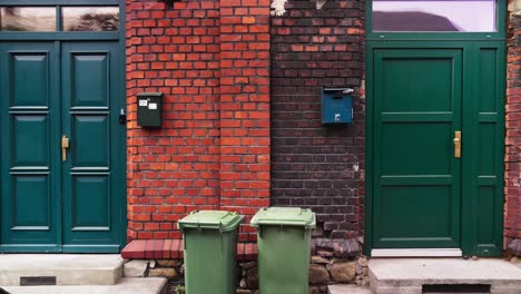 Connected-brick-houses-of-a-19th-century-workers'-colony-in-Ostrava-Vítkovice,-featuring-dual-entrance-doors