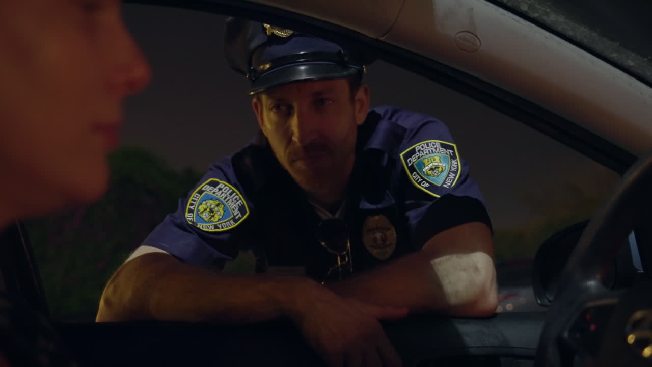 Police officer leans into the window of a car, Driver offers money. The officer refusing the bribe. Cop rejection of unethical behavior, emphasizing professionalism during a routine traffic stop.