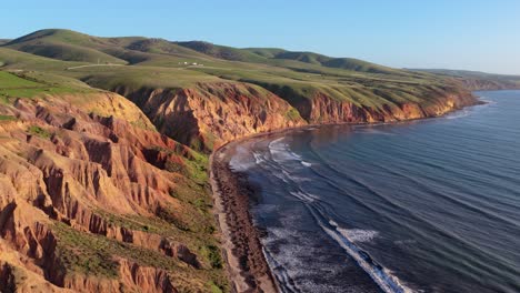 sellicks beach cliffs and green hills aerial with golden light, adelaide, south australia