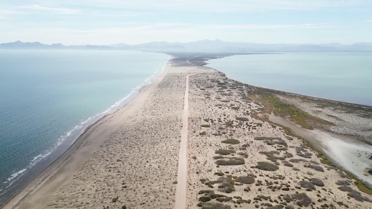 Remote sandbar road stretches through El Mogote in La Paz, Baja California Sur, Mexico