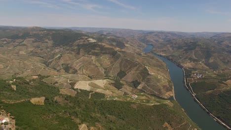 the douro river crossing mountains aerial view