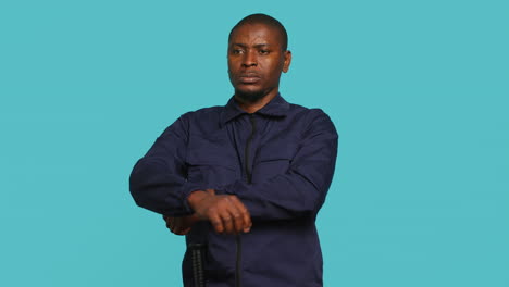 portrait of menacing security guard in threatening pose