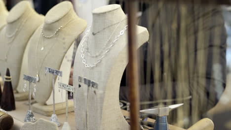 close-up of necklaces and jewelry on display