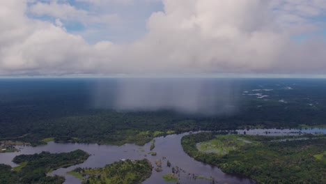 rain arriving in the amazon rainforest