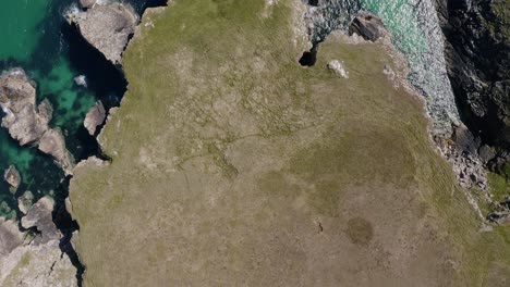 Birds-eye-view-of-a-cliffside-near-a-peatland-on-the-Isle-of-Lewis,-Outer-Hebrides-of-Scotland,-United-Kingdom