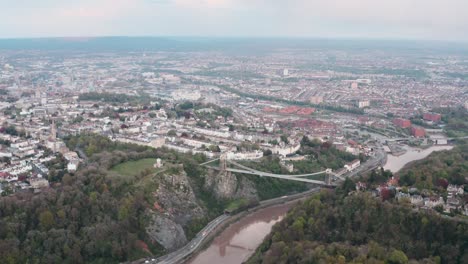 High-circling-drone-shot-over-central-Bristol-and-the-clifton-suspension-bridge