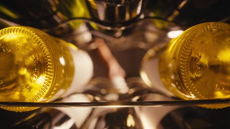 close-up view of wine bottles in a wine rack