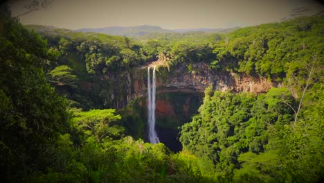 majestic waterfall in lush tropical forest