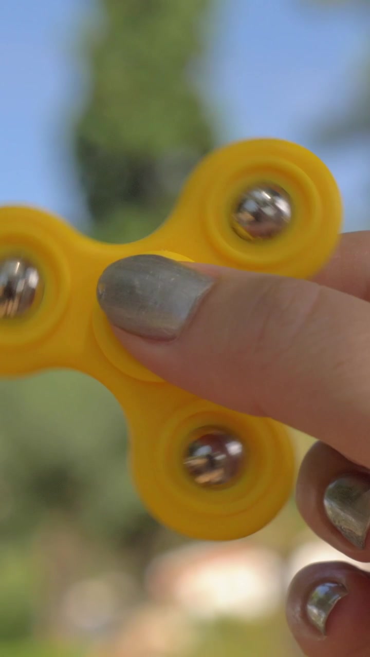 Woman relaxing with spinner fidget