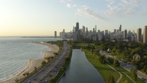 fixed aerial view of lincoln park, chicago skyline, lake michigan on summer day