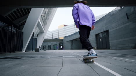 Active-man-making-kickflip-with-skateboard-outside.-Skater-riding-on-longboard.