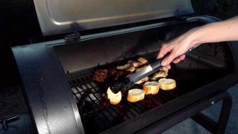 chicken wings and hanging tender meat on the grill