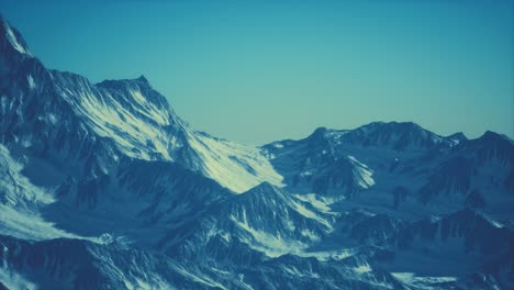 Aerial-view-of-the-Alps-mountains-in-snow