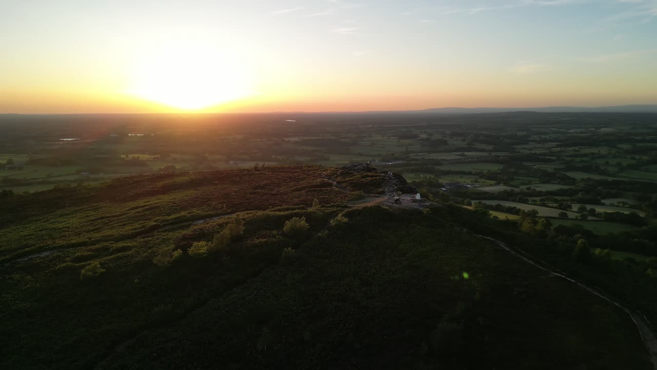 The stunning spiritual Cloud at Bosley on a full moon weekend at sunset , Staffordshire UK - drone clockwise rotate