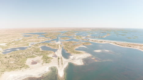 aerial drone point of view of aydar kol lake in uzbekistan, central asia