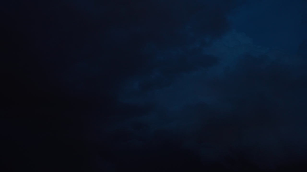 Distant Storm Lighting Up the Horizon with Frequent Bolts of Electricity