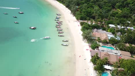 Tropical-White-Sand-Beach-With-Rainforest-and-Boats