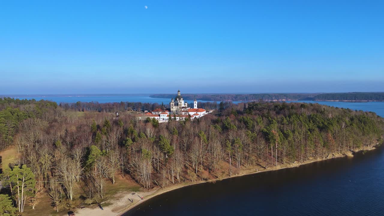 Stunning monastery of Pazaislis in a forest of a peninsula in Kaunas