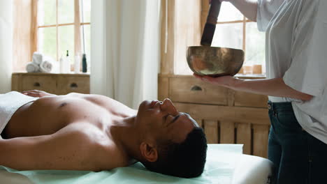 man relaxing on a stretcher