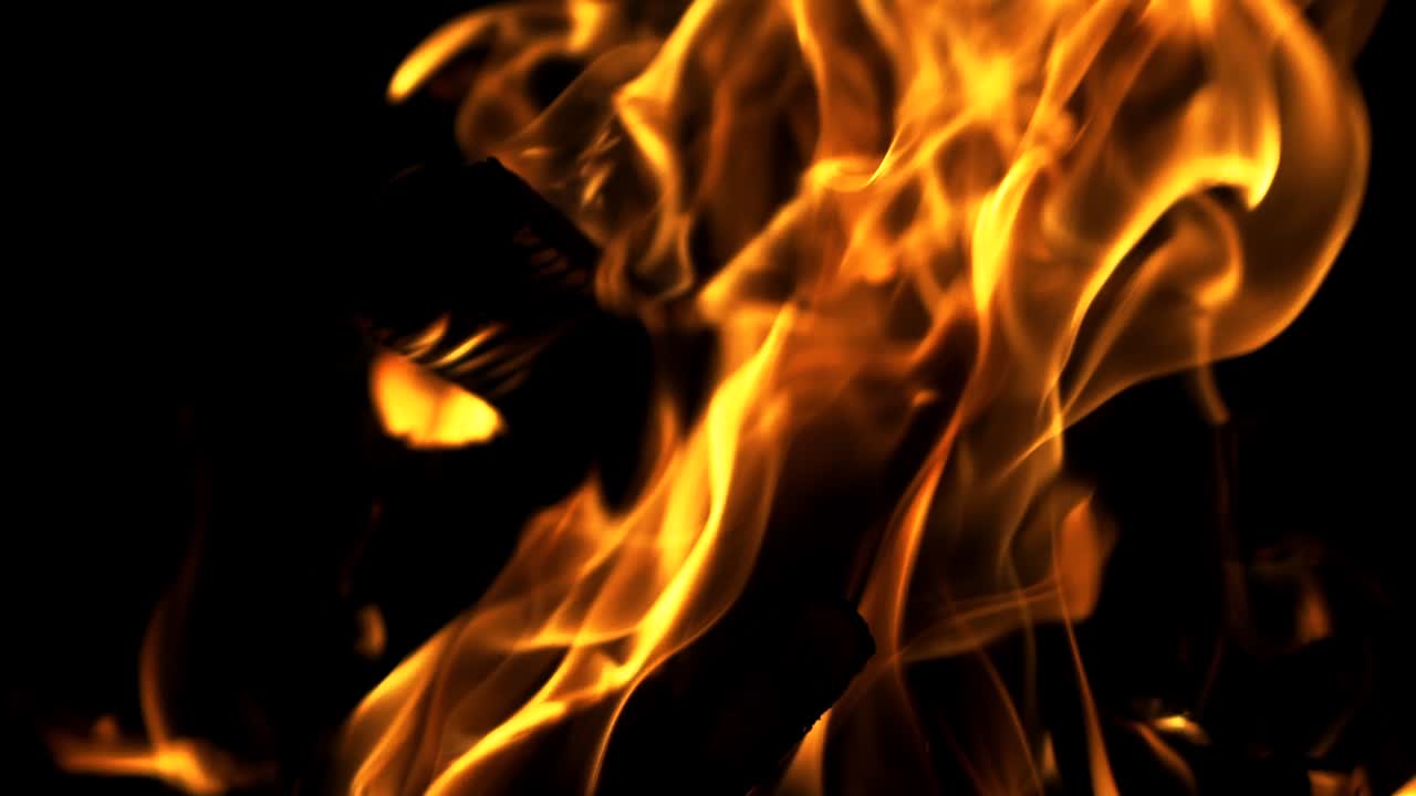 Burning Wood in Slow Motion. Bonfire. The fire is lit in the night