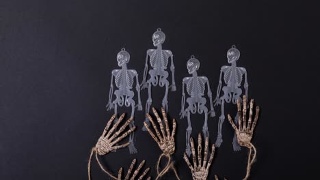 animation of skeletons on black background