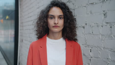 woman in red jacket, street portrait
