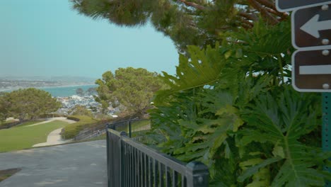 Brown-coastal-trail-signage-near-a-park-in-Southern-California