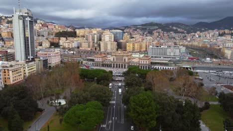 Genoa-city-center-with-busy-street-traffic,-train-station-and-greenery