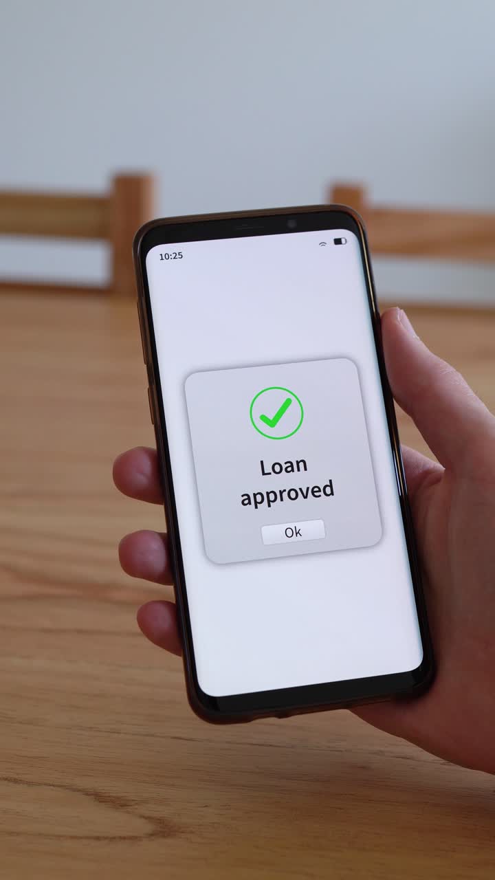 Vertical shot of phone app checking credit score for loan approval
