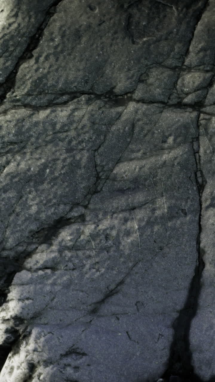 Natural stone textures revealing the rugged beauty of a rocky coastline