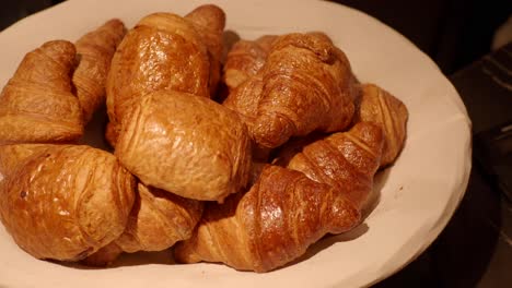 a plate of croissants