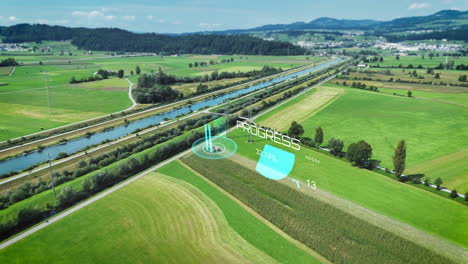 tractor mowing on agricultural field with digital hud elements progress display and speed of work, drone shot