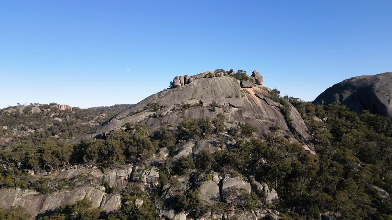 Right to left aerial Footage, the Pyramid, Girraween National Park, Southern Queensland Australia. Girraween National Park is located near Stanthorpe and the Queensland and New South Wales border.