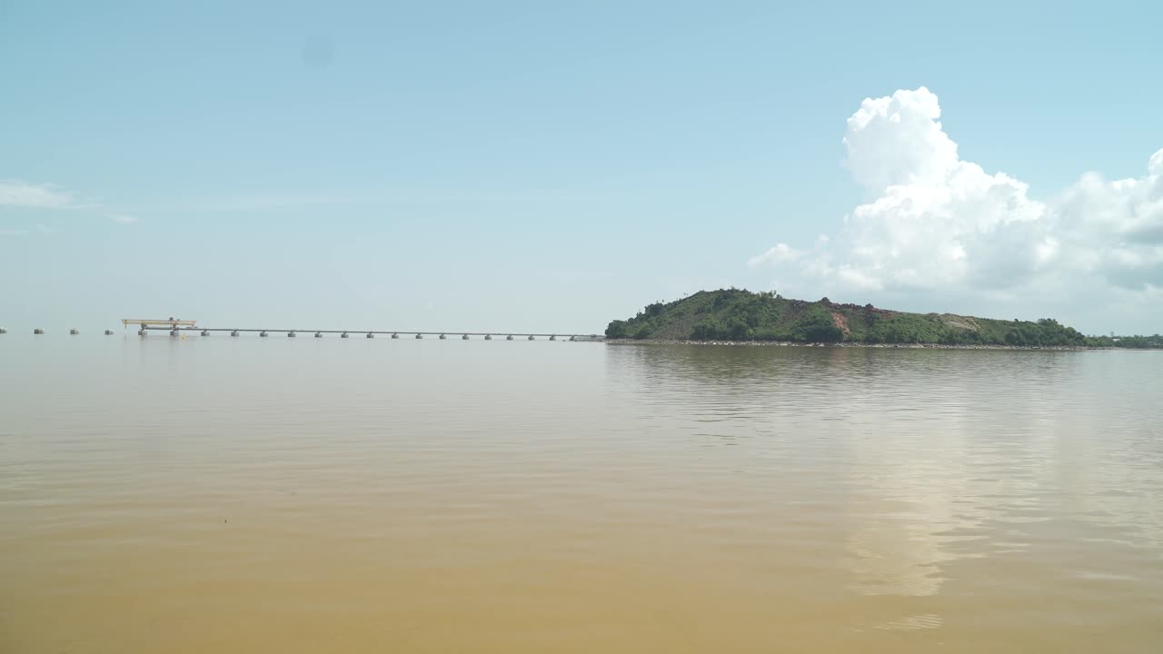 Batang Lupar Sarawak River Ferry Ride View During Summer,Mangrove Trees And Under Construction Longest Bridge Conecting From each side,Sarawak,Borneo.