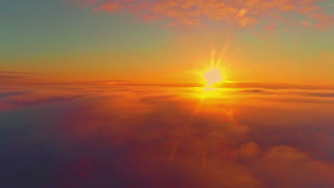 Lebendige-Farbige-Sonnenuntergangsansicht-Von-über-Den-Wolken,-Antenne-Weit-Geschossen