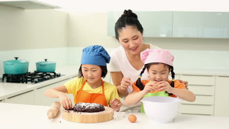 mother and daughters baking together