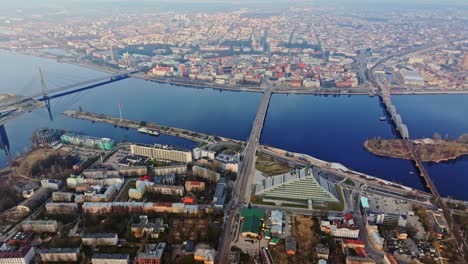 calm aerial captures of riga bridges and library with daugava river reflections