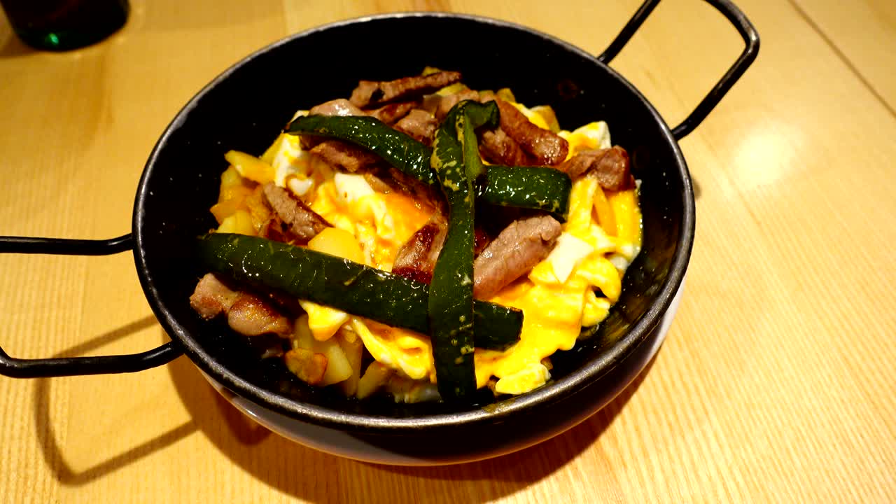 The pork baked with potato, Madrid.