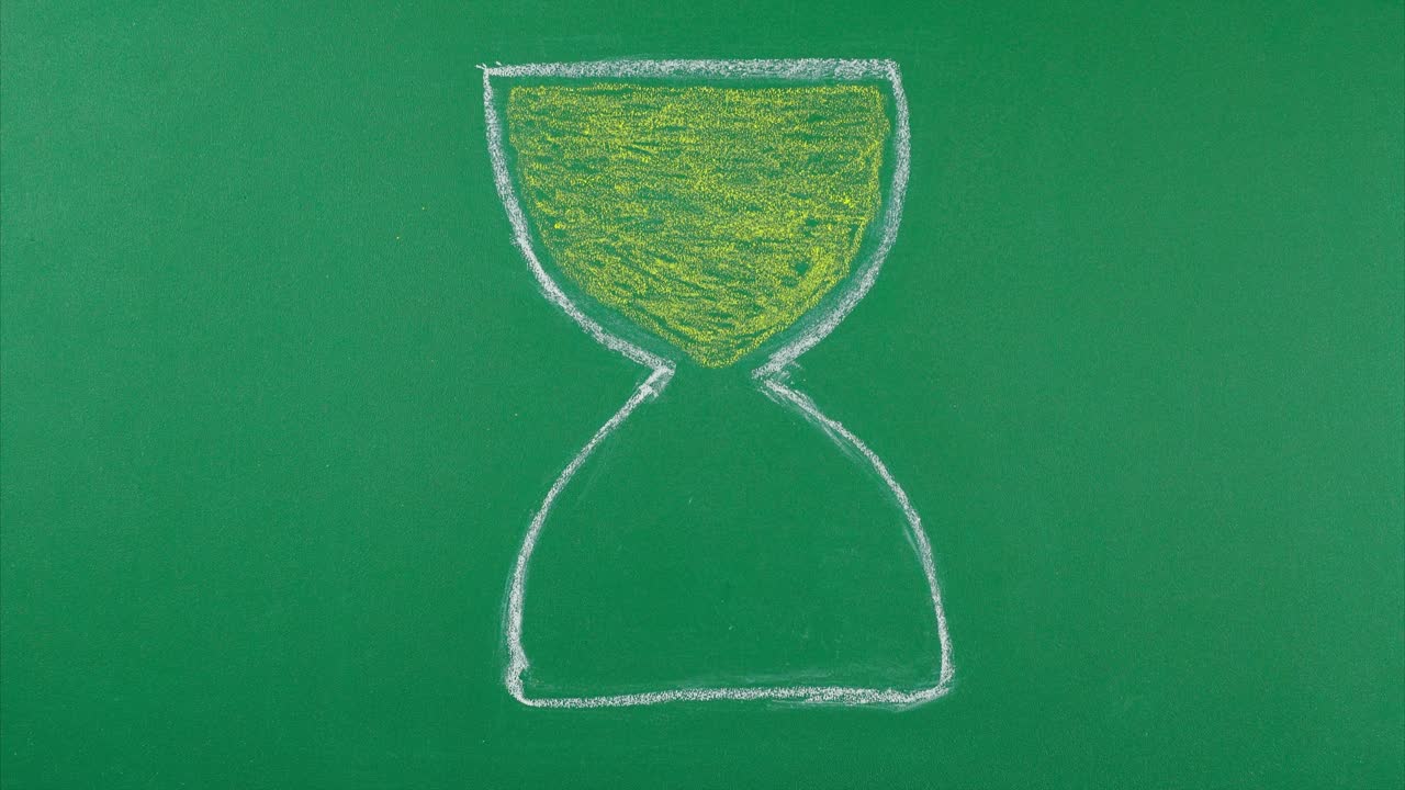 Stop motion, hourglass, time is spilled from top to bottom