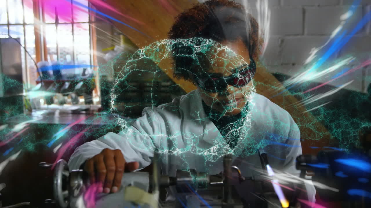 Animation of digital brain over african american male scientist working in lab