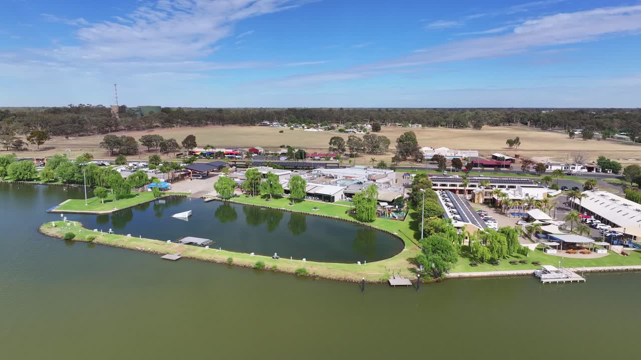 Aerial view of Mulwala Ski Club buildings lawns and water ski ramps in Lake Mulwala