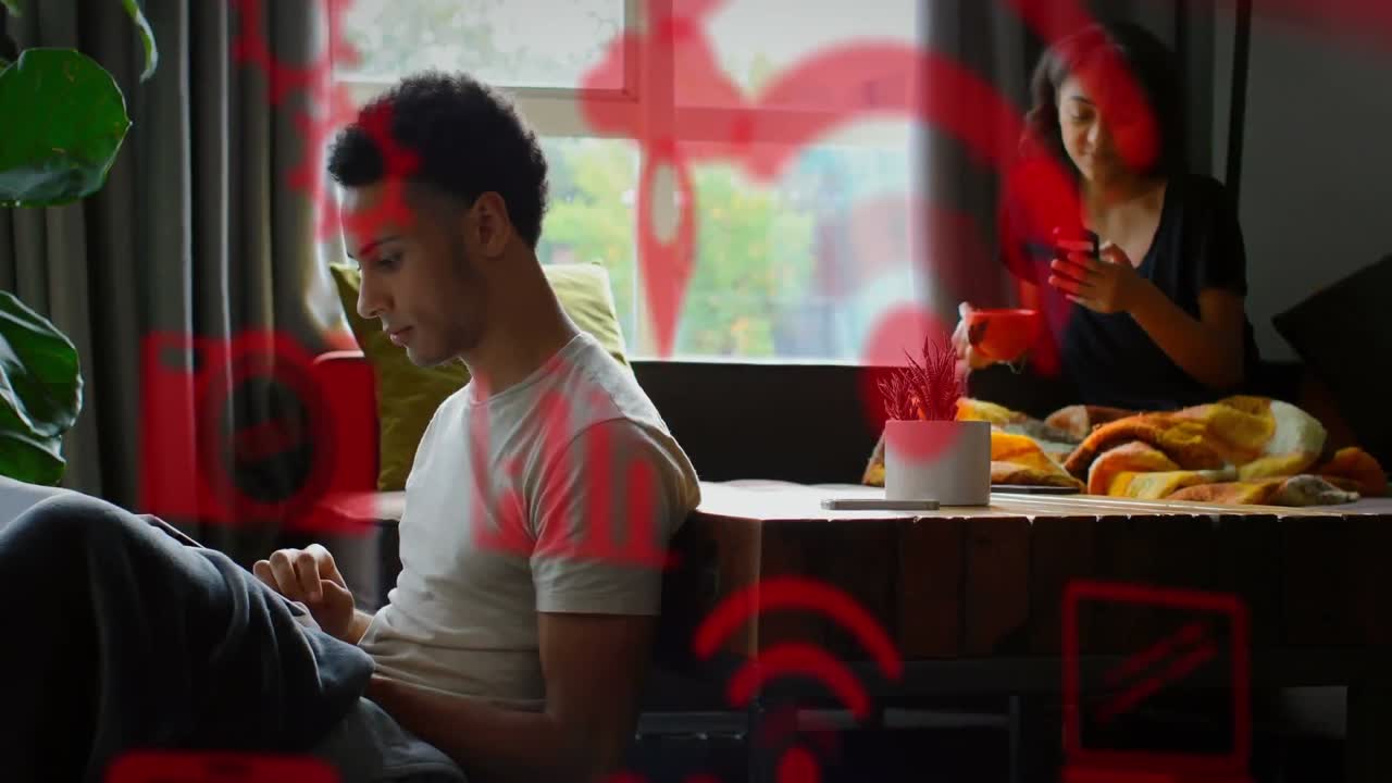 디지털 아이콘이 디지털 태블릿과 스마트 폰을 사용하여 커플에 대해 움직입니다.