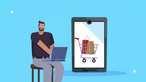 hombre de negocios usando una computadora portátil con un carrito de compras en un teléfono inteligente
