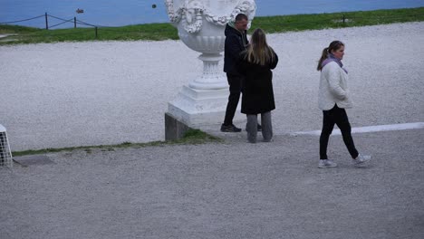 people strolling in schonbrunn palace park in vienna, austria