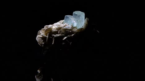 a beautiful double crystal of aquamarine in a matrix of muscovite